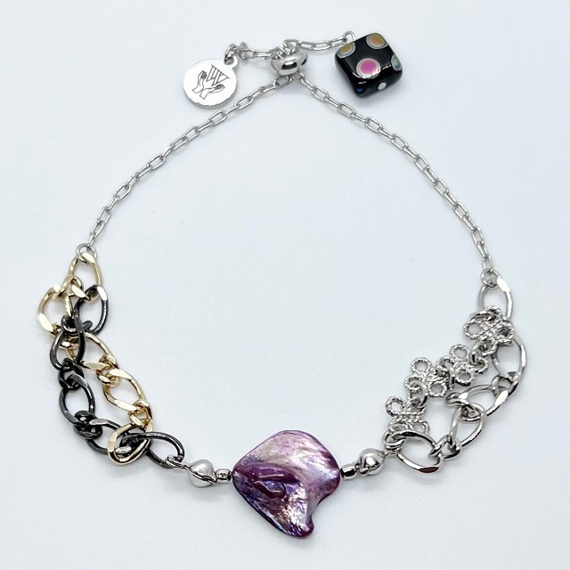 A bracelet with a purple stone