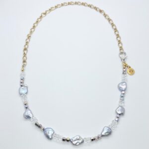 Golden and silver necklace with a heart design